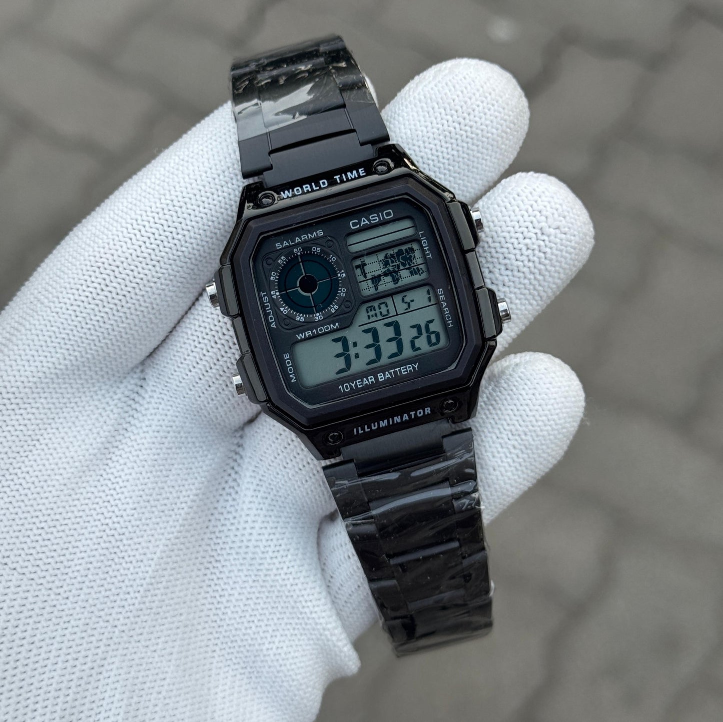 WORLD TIME ILLUMINATOR STAINLESS STEEL WATCH